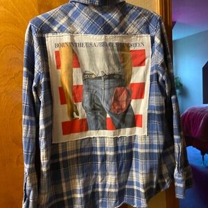 Flannel shirt with bruce springsteen on it back
